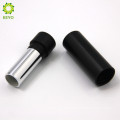 empty cosmetic container round black metal aluminium lipstick tube